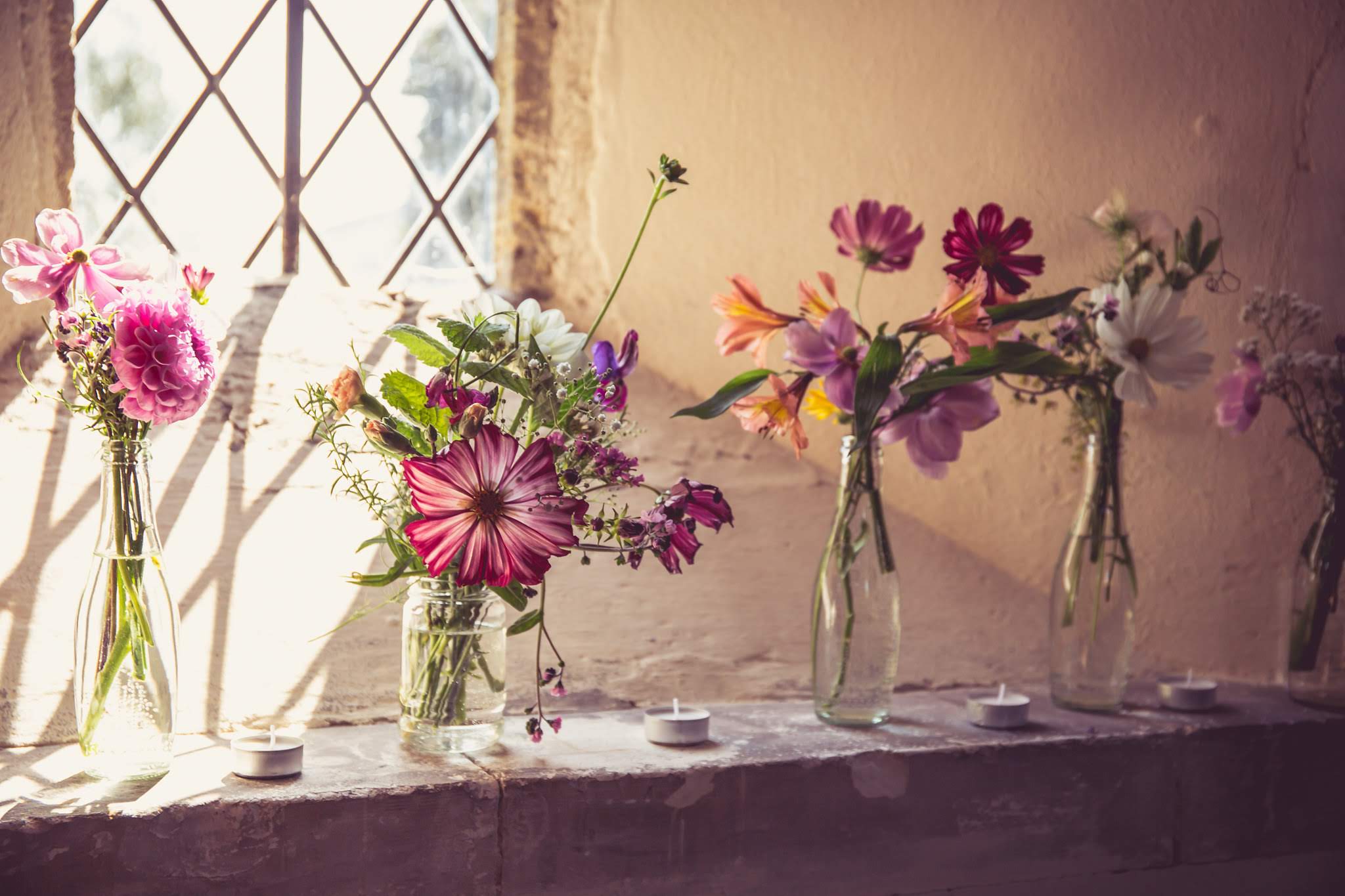 Flowers in jam jars